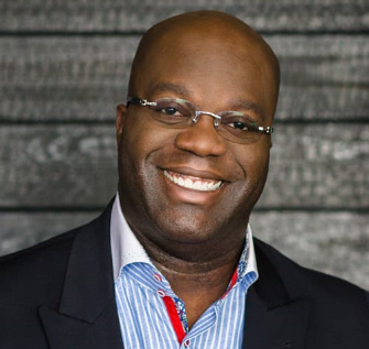 Headshot of Franchise Event Keynote Speaker, Simon T. Bailey